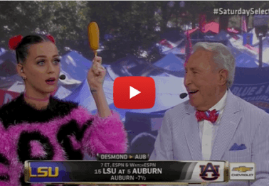 Katy Perry joins College Gameday, brings corn dogs, takes Corso's headgear and slams it