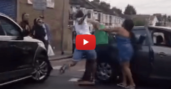 Watch as road rage leads to a massive fist-wielding brawl