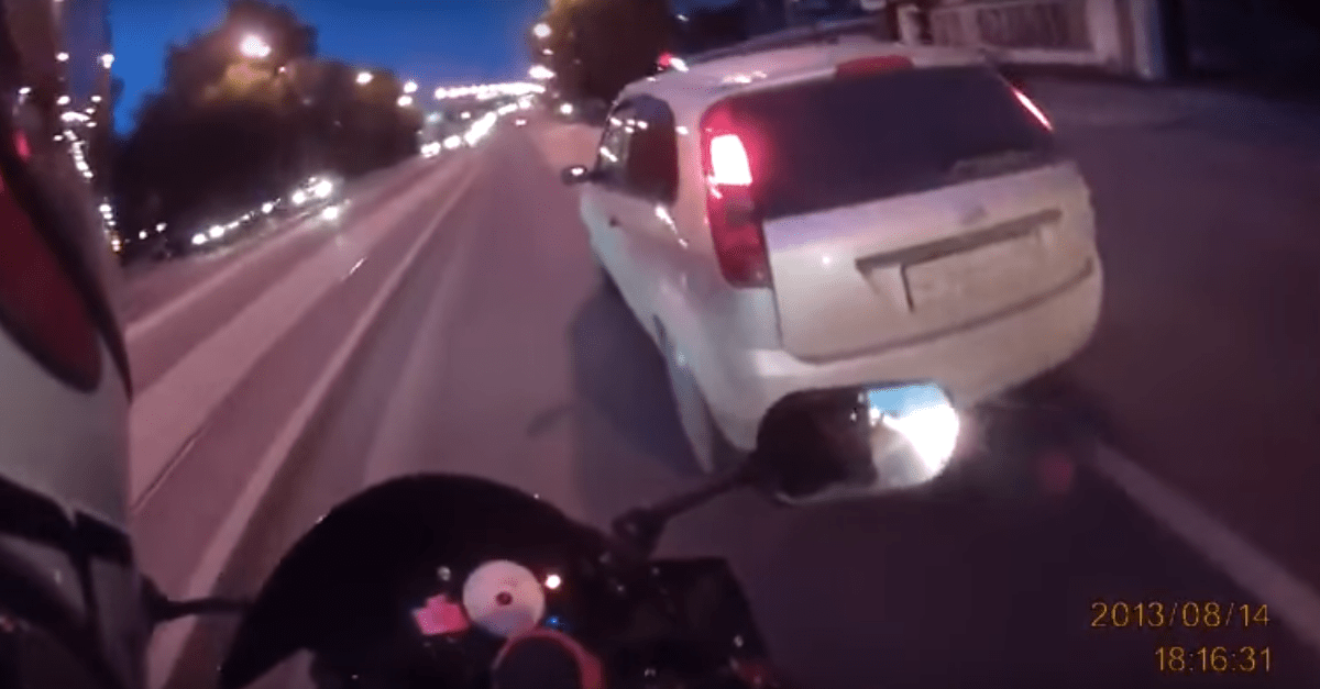 Road raging biker gets what he deserves when he messes with the wrong car