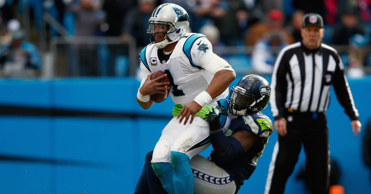 Cam Newton defends himself for not diving on fumble