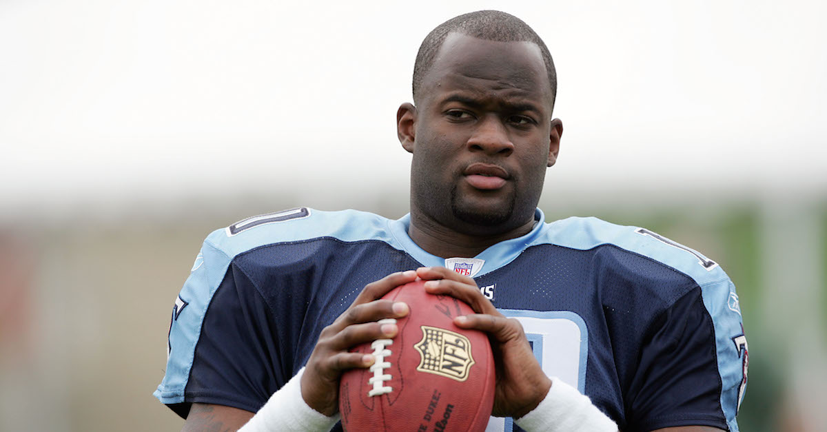 Tennessee Titans rookie quarterback Vince Young talks to the