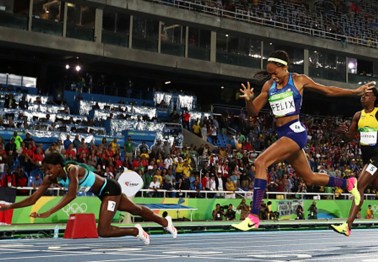 Bahamas sprinter Shaunae Miller's dive across the finish line cost Team USA's Allyson Felix her fifth gold medal