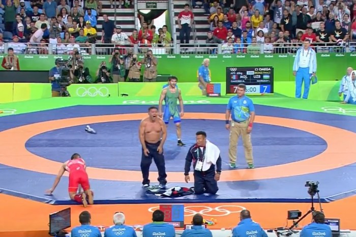 Mongolian wrestling coaches lost their shirts and their minds after losing on a controversial decision