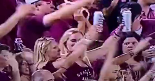 One FSU fan shows off true talent as she double fisted some beers and still chopped away
