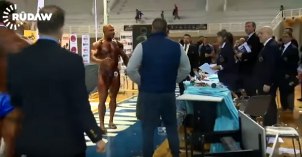 This body builder should be banned after he freaks out and decks an official