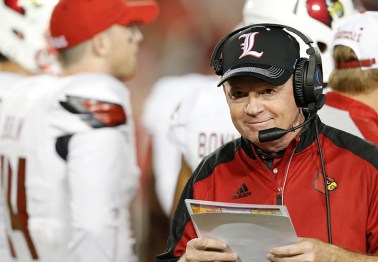 Louisville announces suspension of coach following Wake Forest scandal