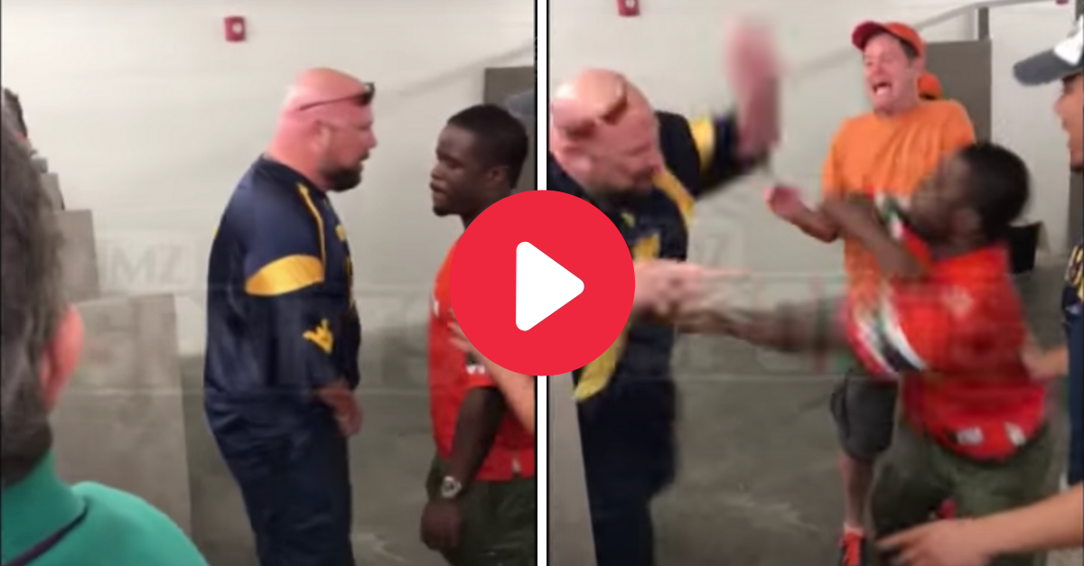 Man Threatens to Pee on Rival Fan, Gets Punched in the Face