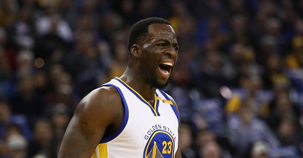 Police had to step in during an altercation between a fan and Draymond Green