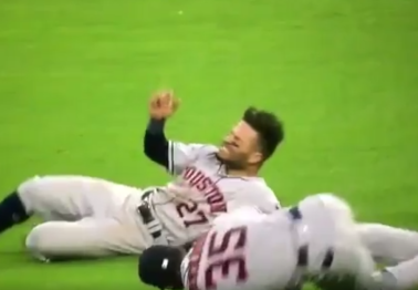 In a frightening sight, two players collide in the outfield and one has to be carted off the field