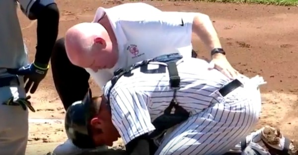 Catcher takes a foul ball off the throat, forced to leave the game after getting hit again