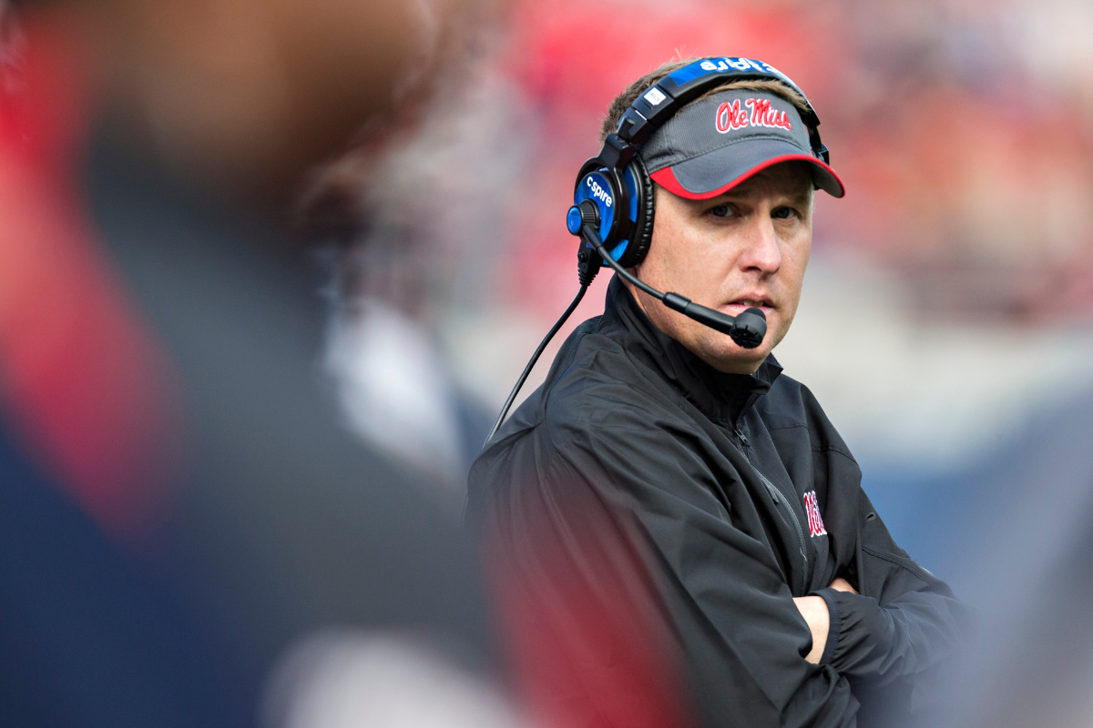 Head coach Hugh Freeze of the Ole Miss Rebels looks on from the sidelines during a game against the Arkansas Razorbacks at Vaught-Hemingway Stadium