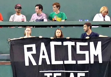 Red Sox remove a racism banner that was draped over the fabled Green Monster