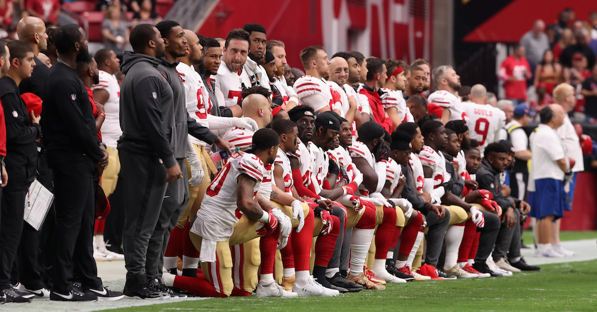 Team releases statement after nearly 30 players kneel for national anthem