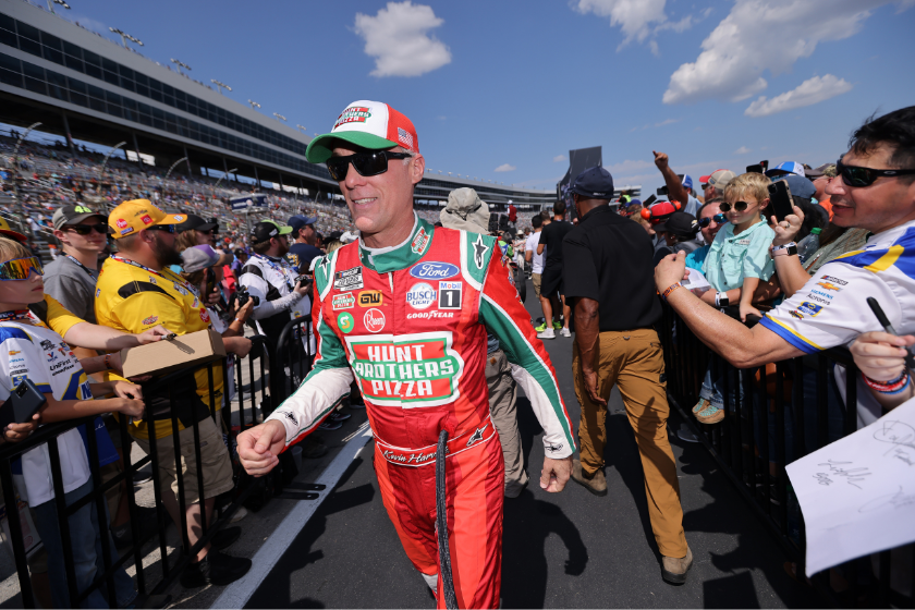 Kevin Harvick greets fans during pre-race ceremonies prior to the NASCAR Cup Series Auto Trader EchoPark Automotive 500 at Texas Motor Speedway on September 25, 2022