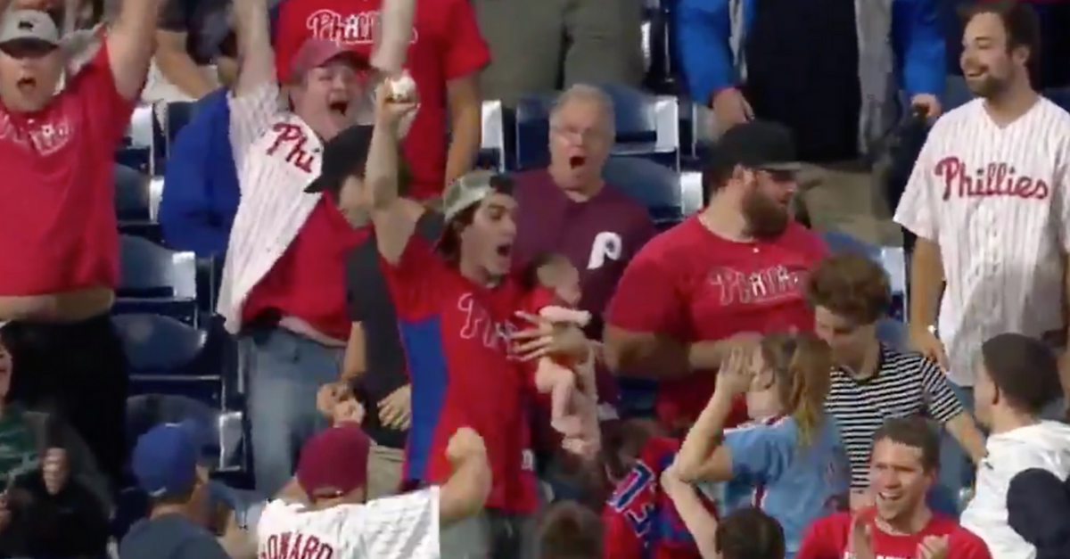 Phillies Fan Snags Home Run While Holding a Baby - FanBuzz