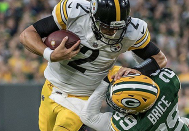 WATCH: Steelers Backup QB Stiff Arms Defender Into Next Week