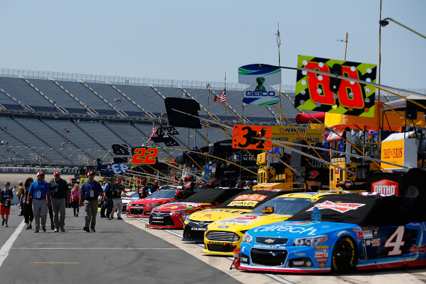 Cars are lined up on pit road prior to the NASCAR Sprint Cup Series FedEx 400 Benefiting Autism Speaks at Dover International Speedway on May 31, 2015
