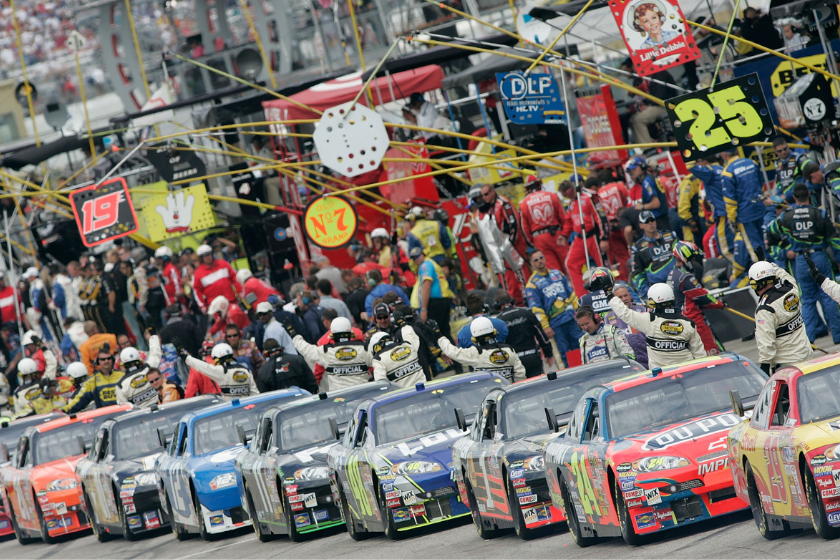 Cars sit on pit road prior to the NASCAR Nextel Cup Series Lenox Industrial Tools 300 at New Hampshire International Speedway on July 1, 2007