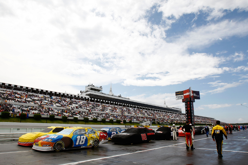 The field sits on pit road during a rain delay in the NASCAR Sprint Cup Series Gillette Fusion ProGlide 500 at Pocono Raceway on June 6, 2010