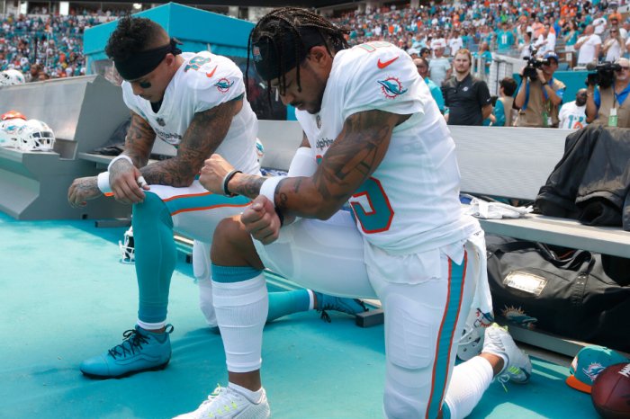 Colin Kaepernick Praises Two Dolphins Players for Kneeling During Anthem