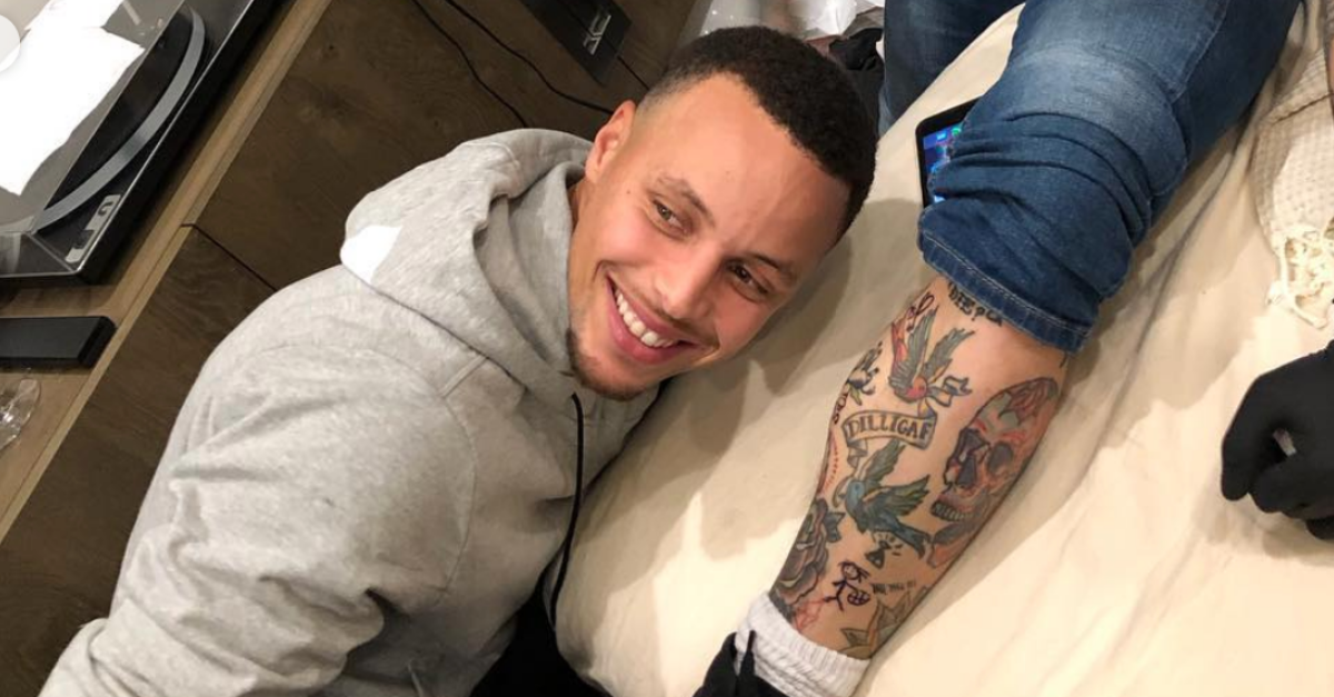 After losing a Game 4 bet Warriors fan pays up and gets a Richard  Jeffersoninspired tattoo