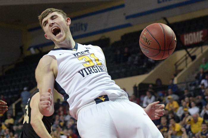 WATCH: WVU Player Ejected for Tripping While He’s Riding the Bench