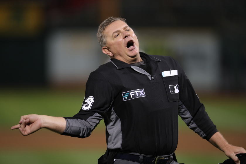 MLB Umpire Greg Bench ejects the Oakland Athletic's Bench Coach during a game in 2021