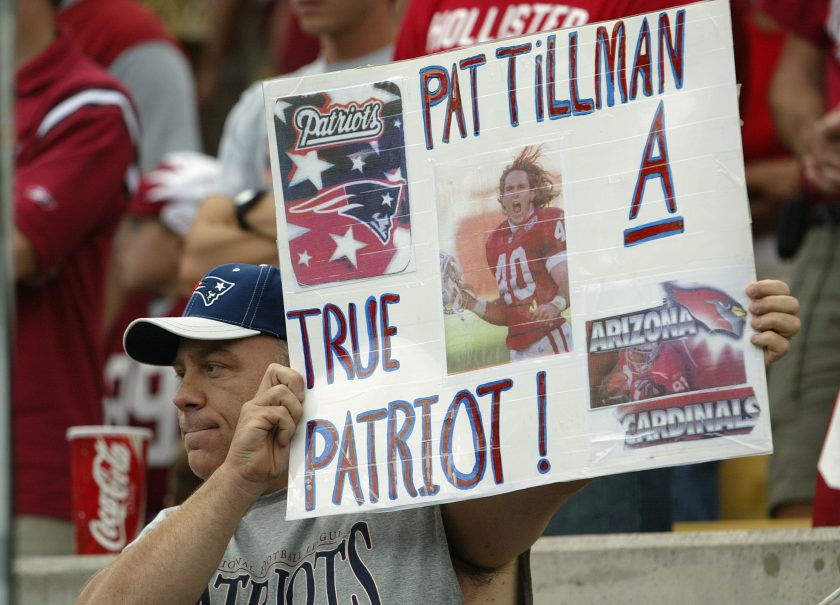 A fan holds up a Pat Tillman sign during a 2004 NFL game.