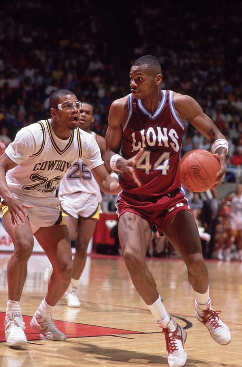 Hank Gathers dribbles during a 1988 college basketball game.