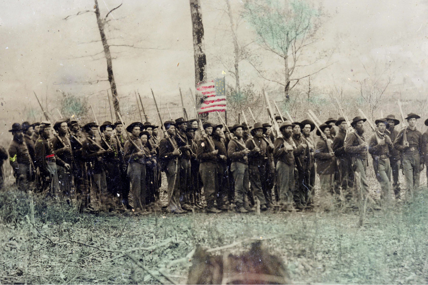 Colour photograph of Union Soldiers of the 2nd Tennessee Volunteer Cavalry pose with their muskets, carbunes, and colt revolving rifles. Dated 1862
