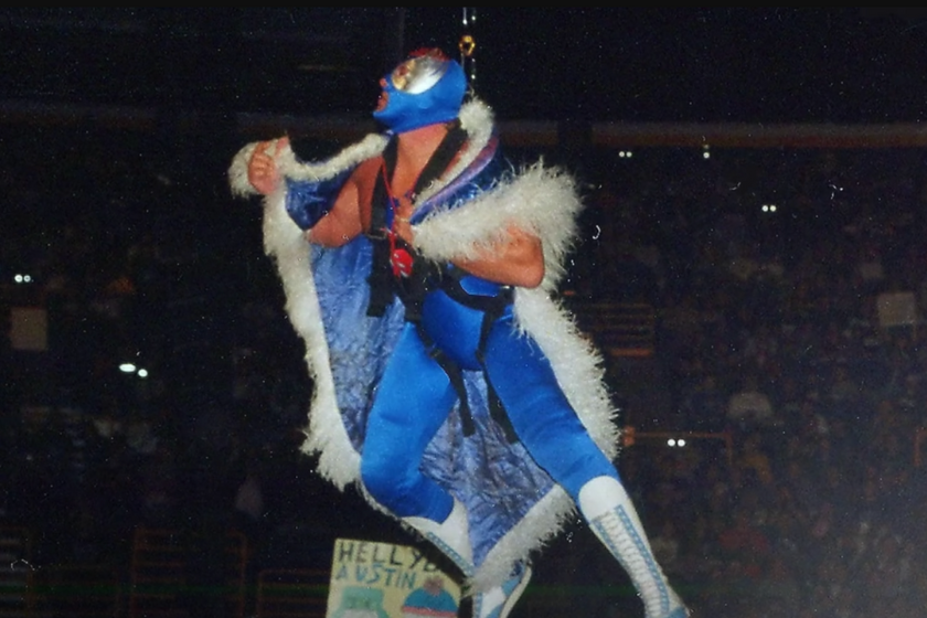 Owen Hart as "the Blue Blazer, a storyline the WWF had developed for him. 