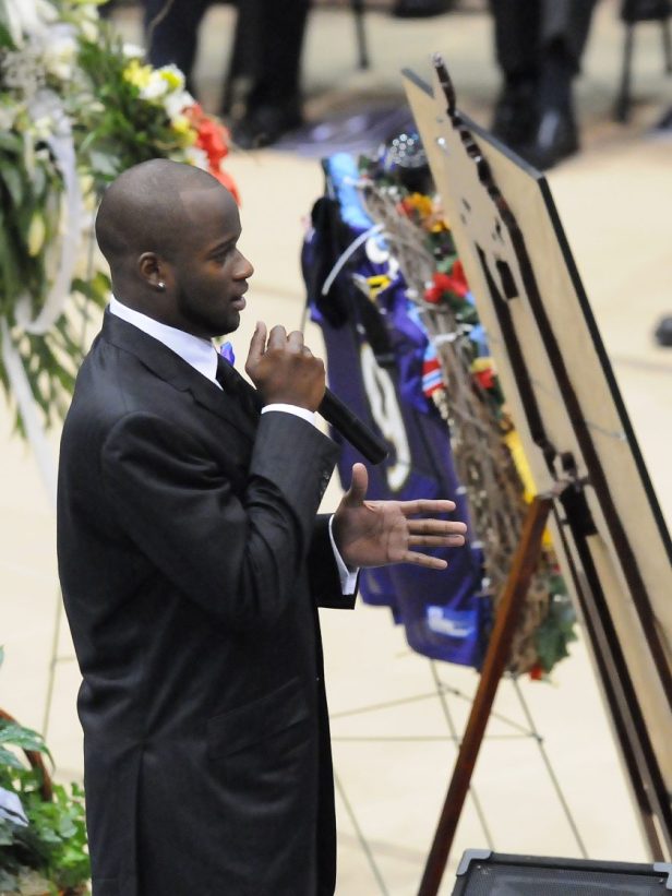 Tennessee Titans quarterback Vince Young makes remarks at a funeral service for former NFL quarterback Steve McNair.