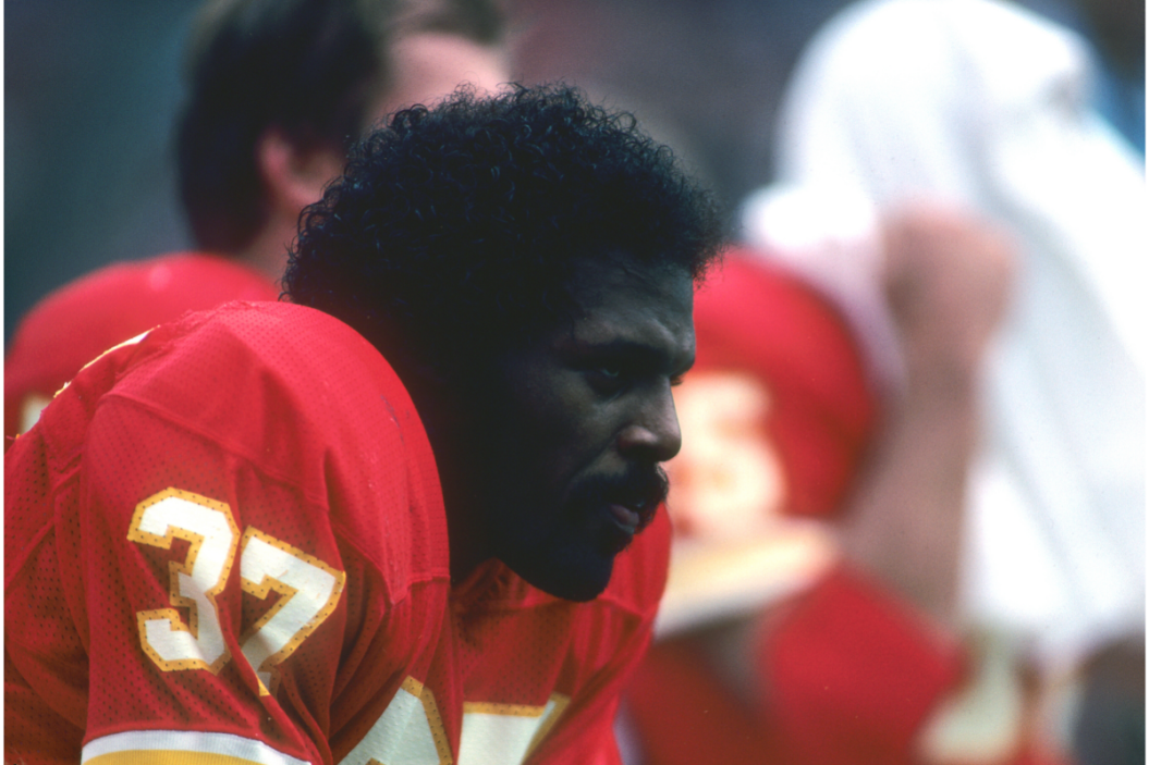 Joe Delaney sits on the bench of a 1982 Chiefs game.