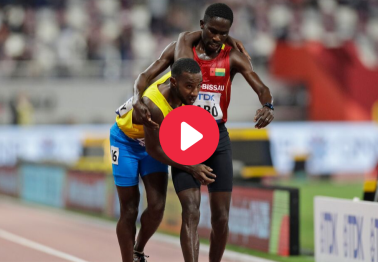 Runner Carries Rival Across the Finish Line at World Championships