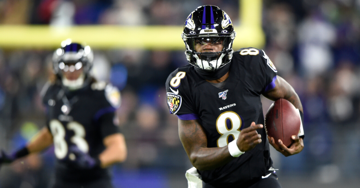 Lamar Jackson Breaks Michael Vick's QB Rushing Record - FanBuzz