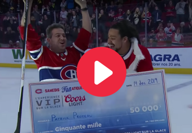 Improbable Shot Lands $50,000 Into Hockey Fan's Pocket