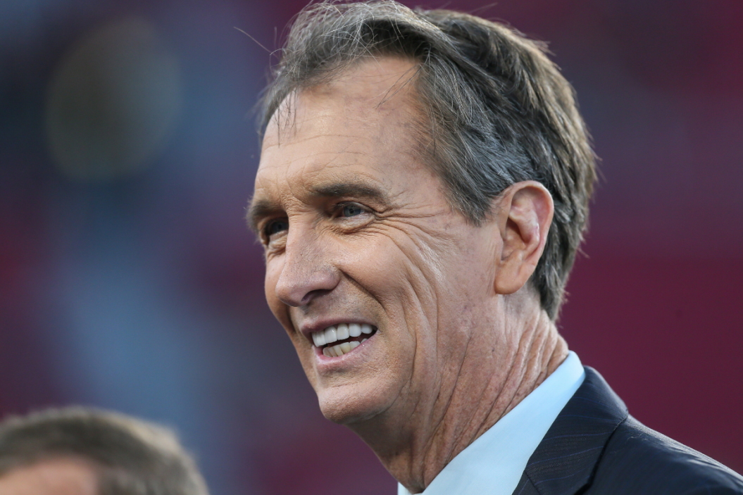 Cris Collinsworth smiles during a broadcast.