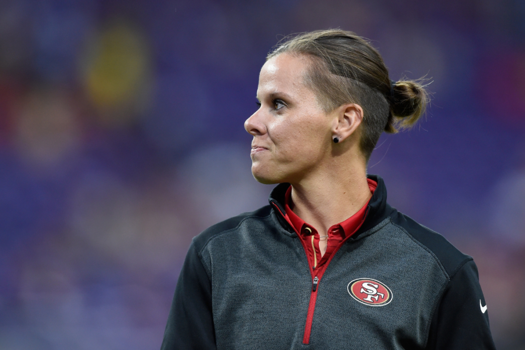 San Francisco 49ers coach Katie Sowers looks on before an NFL preseason game.