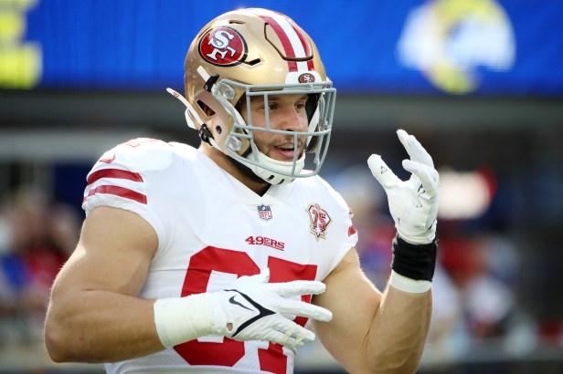 Nick Bosa smiles during a game against the Rams in 2022.