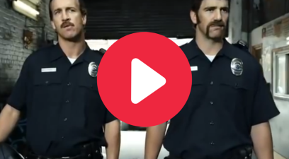 Peyton Manning and Eli Manning as football cops in a commercial.
