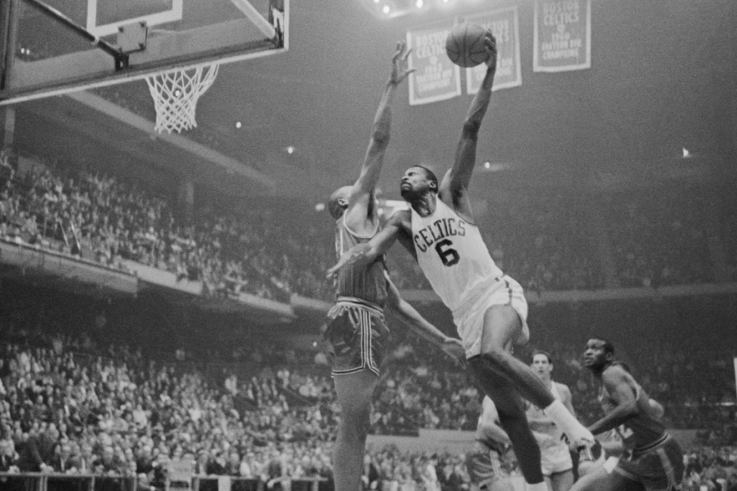 Bill Russell drives to the hoop.