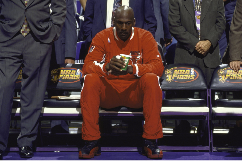 Michael Jordan sits on the bench ahead of Game 5 of the 1997 NBA Finals