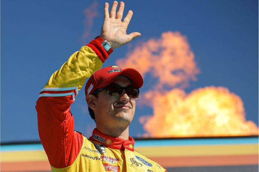Joey Logano waves to fans onstage during Championship 4 driver intros prior to the 2022 NASCAR Cup Series Championship at Phoenix Raceway