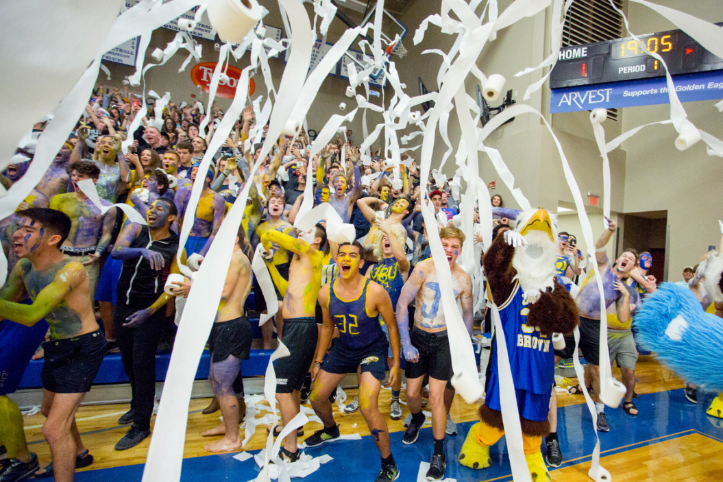 John Brown University shower the court with toilet paper in their annual toilet paper game.