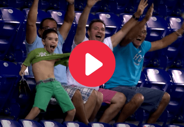 Kid Loses His Mind When Jumbotron Camera Finds Him