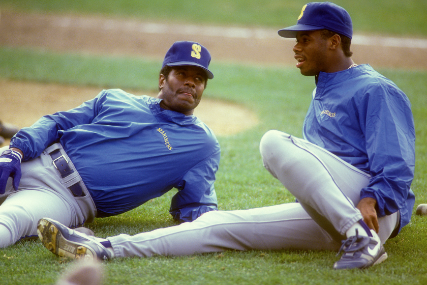 Ken Griffey Sr. and Ken Griffey Jr. warming up before a Mariners game. 