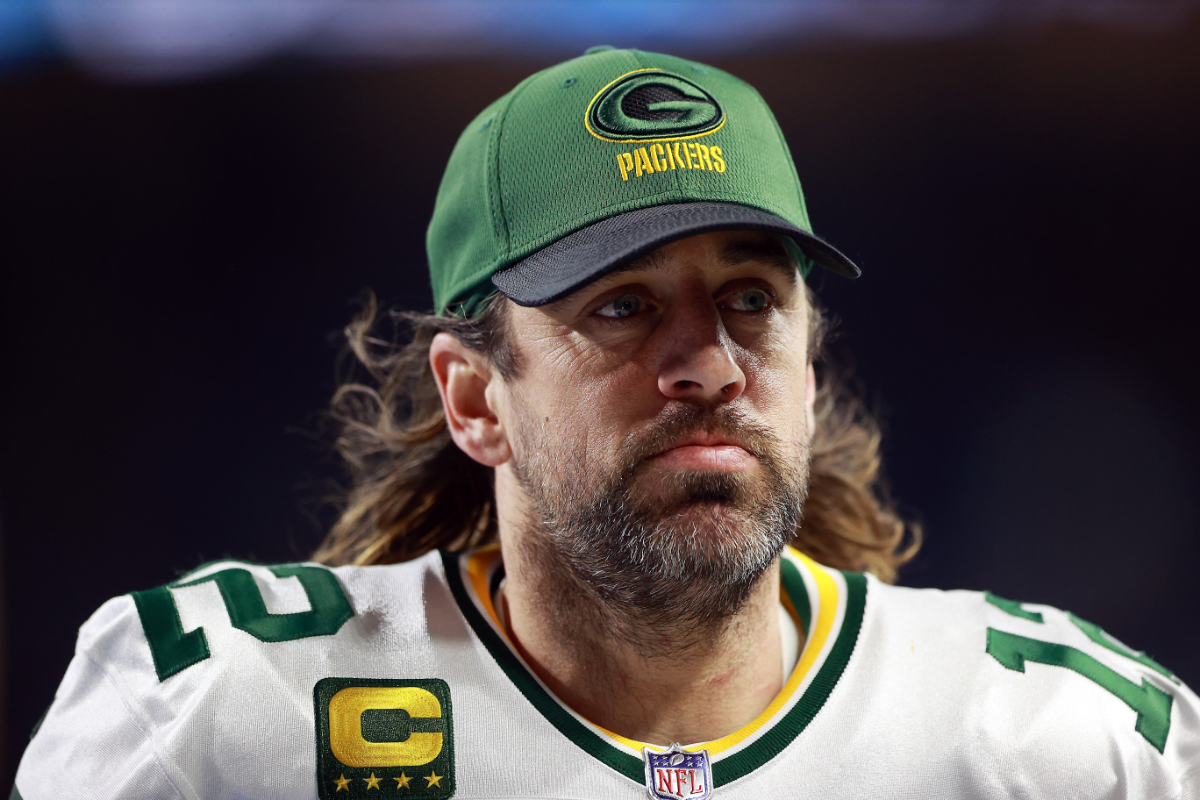 Aaron Rodgers heads to the locker room at halftime against the Lions in 2022.