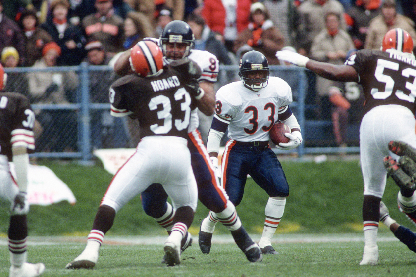 Chicago Bears running back Darren Lewis looks for a hole to run through against the Cleveland Browns.