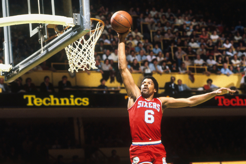 Julius Erving #6 of the Philadelphia 76ers dunks circa the 1970's during a game