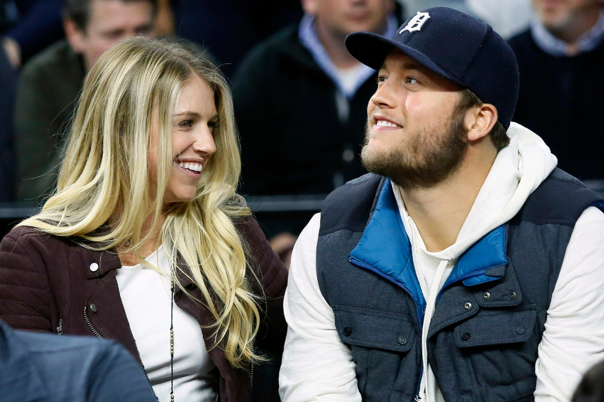 Matthew Stafford and Kelly Stafford attend a sporting event together.
